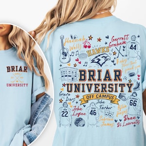 May include: A light blue t-shirt featuring a small Briar University logo on the front left chest. The back displays a large graphic with the text Briar University Off Campus, hockey jerseys with numbers 22, 46, 66, 44, names, and icons.
