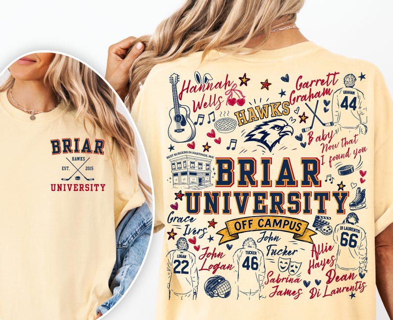 May include: A pale yellow t-shirt featuring a small Briar University logo on the front left chest and a large, detailed graphic on the back. The back design includes the text Briar University, hockey jerseys, a guitar, and various names.