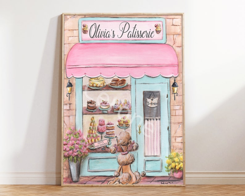 May include: A pastel pink and blue storefront with a sign that reads "Olivia's Patisserie". The storefront has a large window display filled with colorful pastries and cakes. A small dog is standing in front of the store.
