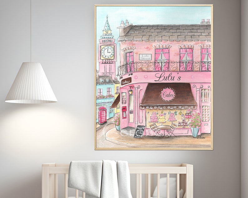May include: A watercolor painting of a pink building with a brown awning that says "Lulu's Cakes". The building is on a street corner with a red telephone booth and a clock tower in the background.