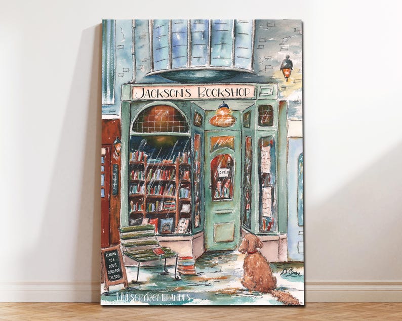 May include: A watercolor painting of a bookstore with a sign that reads "Jackson's Bookshop". The shop has a green door and a window filled with books. A brown dog sits outside the shop.