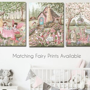 May include: A set of three whimsical fairy-themed paintings. The first painting features two fairies having tea party in a forest setting. The second painting shows a pink cottage with a blue door and a garden path. The third painting depicts a rabbit in a garden with a sign that reads "Madeline's Garden".