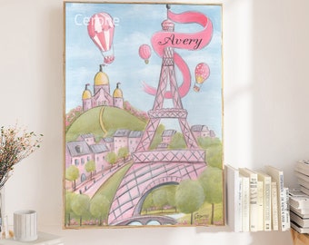 May include: A pink and white painting of the Eiffel Tower in Paris, France. The painting features hot air balloons and the name Avery in a pink banner.