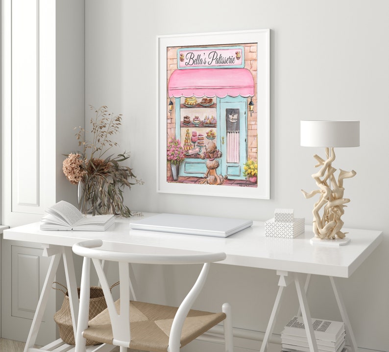 May include: A watercolor painting of a pink and blue storefront with the text "Bella's Patisserie" above the door. The storefront is filled with pastries and cakes. A dog is standing outside the store.