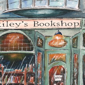 May include: A watercolor painting of a green storefront with the sign "Riley's Bookshop" above the door. The windows are filled with books and the door is open.