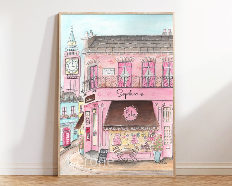 May include: A watercolor painting of a pink building with a brown awning that says "Sophia's Cakes". The building is on a street with a red telephone booth and a clock tower in the background.