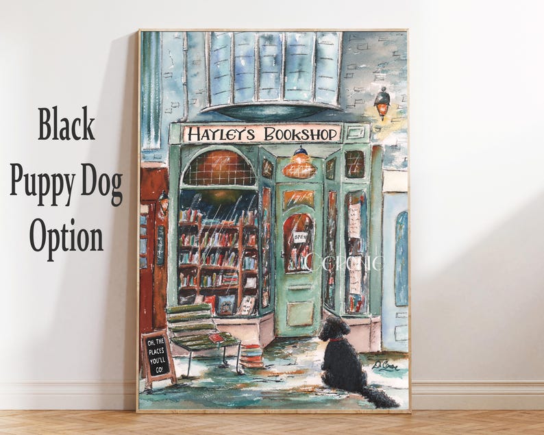 May include: A watercolor painting of a bookstore with a green awning and the words "Hayley's Bookshop" above the entrance. A black puppy dog sits on the sidewalk in front of the store.