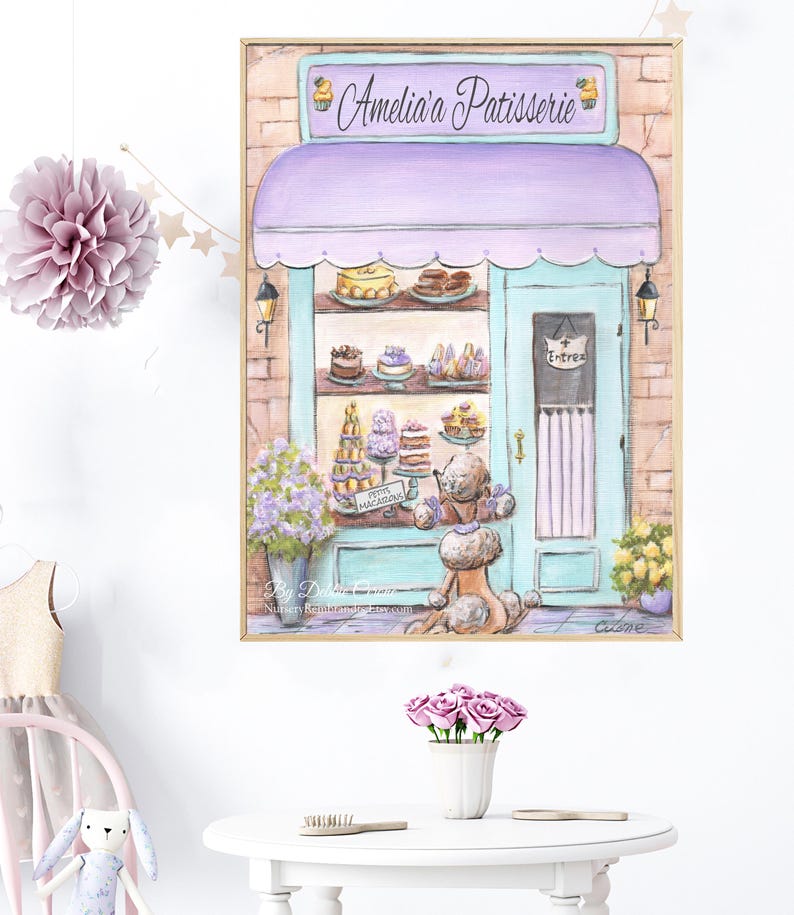 May include: A watercolor painting of a pastel-colored storefront with a sign that reads "Amelia's Patisserie". The storefront has a lavender awning and a turquoise door with a sign that reads "Entree". A poodle stands outside the shop looking at the pastries in the window.