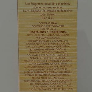May include: A product label for Lady Stetson cologne. The label is beige with black text, including the brand name, product type, ingredients, and a warning about flammability. The bottle contains 1.5 fl oz, equivalent to 44 ml.