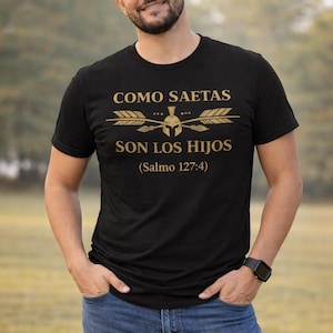 May include: A white ceramic mug with a black handle and the text "But First, Coffee" in a black, bold font. The mug is on a white surface.