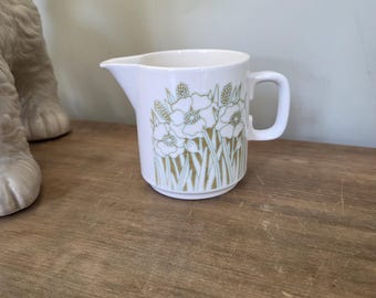 Jarra de leche antigua de cerámica Hornsea con diseño de flor
