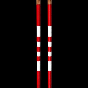 May include: Two wooden poles with alternating red and white stripes. The top and bottom sections are natural wood. The poles are set against a black background.