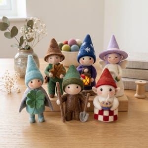 May include: A collection of handmade felted gnome figurines, each with unique hats and accessories. The gnomes are dressed in various colors, including green, blue, brown, and red. Some hold items like a lantern, leaf, shovel, and pie. The figurines are displayed on a wooden surface.