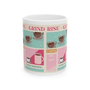 May include: White ceramic coffee mug with a colorful design. The mug features a grid pattern with coffee cup illustrations and the phrases "Rise + Grind" and "Coffee All Day". The words "Good Morning" are also visible.