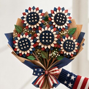 Patriotic layered flower bouquet laser cut file featuring five red white blue wooden flowers, perfect for Independence Day decor and gifts.