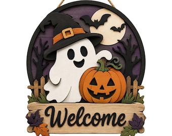 May include: A layered wooden sign featuring a white ghost wearing a black witch hat, an orange jack-o'-lantern, a full moon, bats, and bare trees against a purple background. A wooden plaque at the bottom displays the text Welcome in black script.