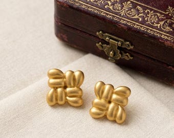 Vintage Monet Signed Matte Gold Clip On Earrings