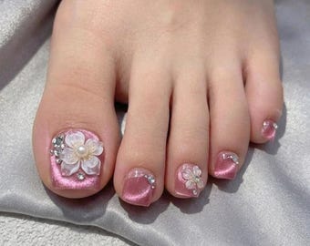 Uñas postizas con forma de ojo de gato rosa / Pedicura magnética de lujo con flores y perlas en 3D / Uñas de los pies con brillo rosa