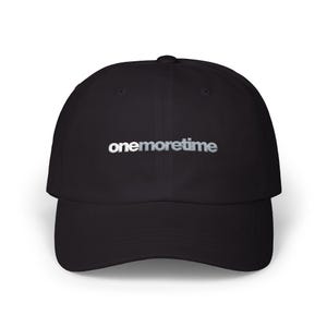 May include: Black baseball cap with the text "onemoretime" embroidered in silver thread across the front. The cap has a curved brim and an adjustable strap at the back for a comfortable fit.