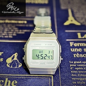 CASIO F-91WS-7JH | Original LCD-klocka | Modifierad | Ersättning för LED-bakgrundsbelysning | Metallarmband i silverfärg | Tillverkad av japanska hantverkare