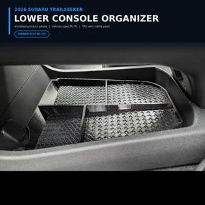 May include: A black lower console organizer for a 2026 Subaru Trailseeker, featuring multiple compartments with textured TPU anti-rattle pads. The text reads 2026 SUBARU TRAILSEEKER LOWER CONSOLE ORGANIZER, Installed product photo, Vehicle-specific fit, TPU anti-rattle pads, OWNER-TESTED FIT.