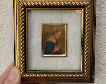 Charming reproduction print on 23 Kt. gold leaf. Made in Italy.