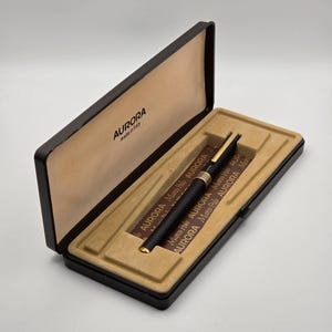 Penna stilografica vintage Aurora Marco Polo, nero opaco e oro, design italiano sottile, regalo aziendale anni '80, in scatola.