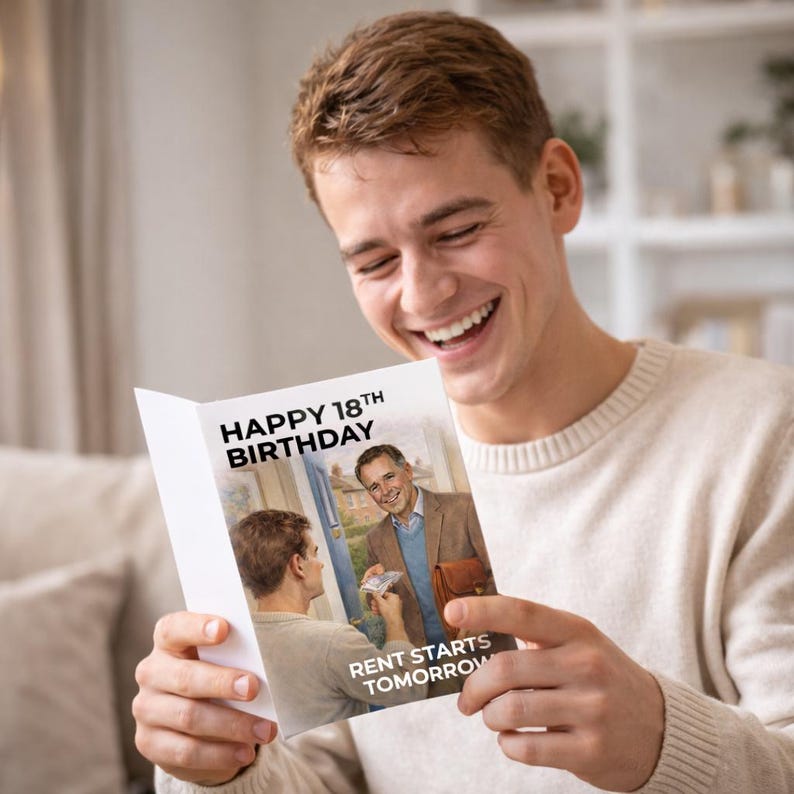 May include: A birthday card with the text "HAPPY 18TH BIRTHDAY" and "RENT STARTS TOMORROW" held by a smiling person. The card features an image of a man handing money to another man.