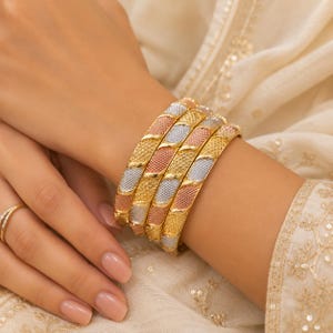 Bracciali impilabili in oro, argento e oro rosa