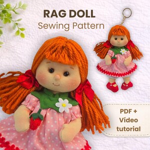 May include: A rag doll sewing pattern with a close-up of a doll with orange yarn hair, red bows, and a pink dress with white polka dots. A smaller doll keychain is also shown. The text "RAG DOLL Sewing Pattern" is at the top.