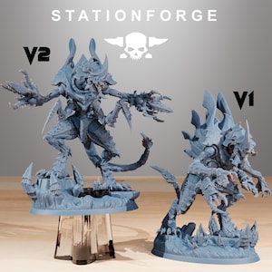May include: Two gray, detailed miniature figures of alien creatures, labeled V1 and V2, are displayed. The figures have multiple limbs, sharp claws, and a menacing appearance. The Stationforge logo and text are visible at the top.