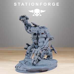 May include: A gray, detailed miniature figure of a mechanical beast with multiple weapons and a raised fist. The figure is on a rocky base, with the word "STATIONFORGE" and a skull logo above it.