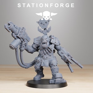 May include: A gray miniature figure of an Orc warrior, holding a large gun and wearing armor. The figure has a menacing expression and is mounted on a black base. The text "STATIONFORGE" is at the top.