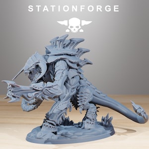 May include: A gray, detailed miniature figurine of a creature with a spiky exoskeleton, large claws, and a long tail. The figurine is on a base with the text "STATIONFORGE" above it and a skull logo.