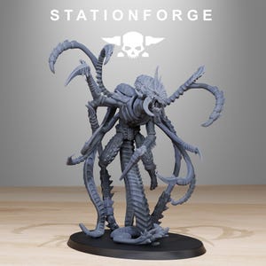 May include: A gray, detailed miniature figure of a monstrous creature with multiple arms, claws, and a segmented tail. The figure is on a black base. The word "STATIONFORGE" is printed above the figure.