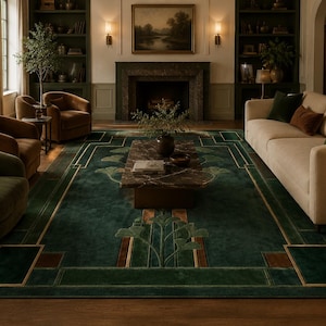 May include: A large rectangular area rug featuring a deep forest green background with geometric gold and brown border accents and a stylized central floral motif. The rug is positioned on a wooden floor beneath a coffee table and sofa.