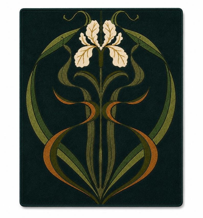 May include: A rectangular dark green mat featuring a centred symmetrical illustration of a cream-coloured iris flower. The design includes long, flowing green and orange leaves that curve outward and upward, creating a circular frame around the bloom.