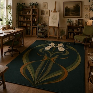 May include: A rectangular area rug featuring a dark teal background with a central stylised white iris flower motif. The design includes sweeping, curved lines in shades of olive green and burnt orange that extend from the base of the flower.