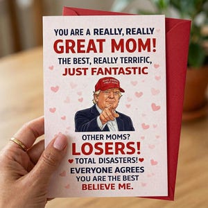 May include: A greeting card with a red envelope. The card has the text "YOU ARE A REALLY, REALLY GREAT MOM!" and an image of a man wearing a red hat. The card also says "OTHER MOMS? LOSERS!"