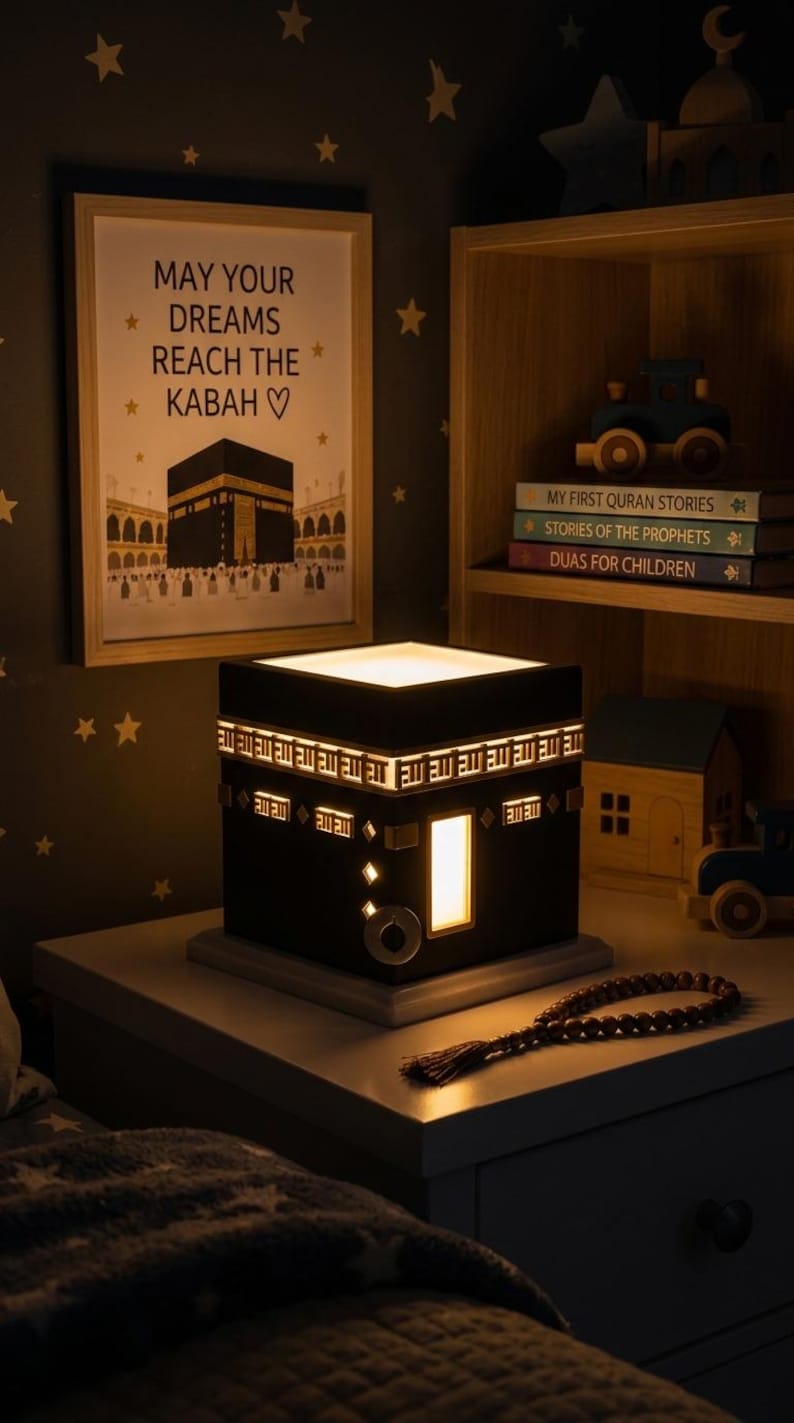 A black Kaaba night light glows on a nightstand in a dimly lit children room.