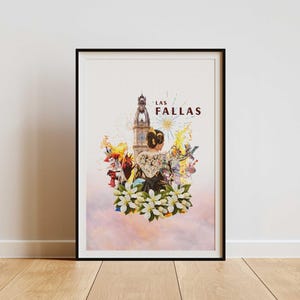 May include: A framed art print with the words "LAS FALLAS" above a vibrant illustration. The artwork shows a woman in traditional dress, surrounded by flowers and a building, set against a soft, pastel background. The print is in a black frame.