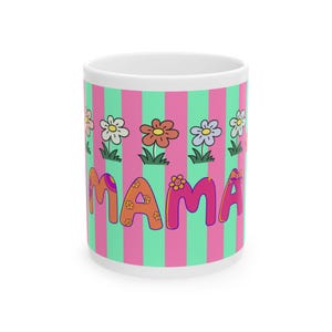 May include: White ceramic mug with a colorful design. The mug features vertical stripes in pink and mint green, with the word "MAMA" in orange and pink, decorated with flower accents. A row of cartoon flowers is above the word.