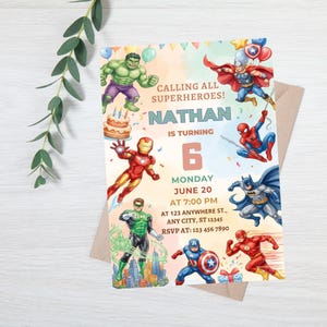 May include: A rectangular birthday invitation card featuring illustrations of Hulk, Thor, Iron Man, Spider-Man, Batman, Green Lantern, Captain America, and The Flash. The text reads: CALLING ALL SUPERHEROES! NATHAN IS TURNING 6 MONDAY JUNE 20 AT 7:00 PM.