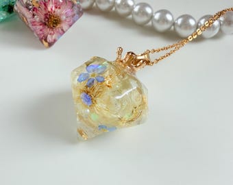 Handmade necklace with dried flowers, white.