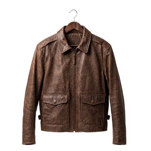 May include: A brown leather jacket featuring a classic collar, a full-length front zipper, and two large flap pockets on the lower front. The jacket has long sleeves, shoulder epaulets, and adjustable side tabs at the hem, all displayed on a hanger.
