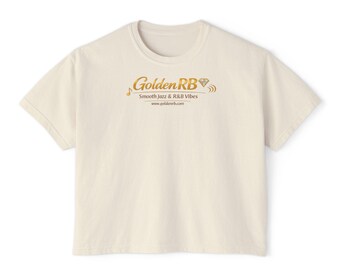 Camiseta holgada de mujer con logo GoldenRB, corte relajado, estilo casual para amantes de la música.