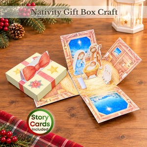 May include: A Nativity Gift Box Craft featuring a folded box with a red bow and a pop-up scene of Mary, Joseph, and the infant Jesus in a manger. The interior displays a stable with a star-filled night sky. Text reads Nativity Gift Box Craft.
