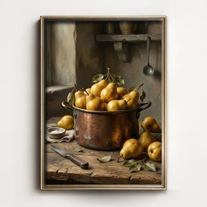 May include: A framed digital download print featuring a still life of pears. A copper pot overflows with yellow pears, some with green leaves, on a rustic wooden table. A knife and small bowl are also on the table. The text "ArtNest LLC -Digital Download-" is at the bottom.