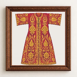 May include: A framed cross-stitch of a red and gold embroidered robe. The robe features intricate gold floral patterns and trim against a red background. The artwork is displayed in a dark brown wooden frame.