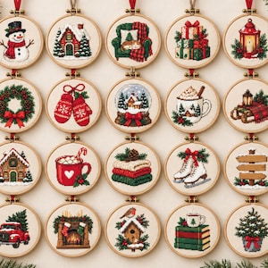 Op de afbeelding: Een verzameling van twintig ronde houten borduurringen met diverse kerstthema kruissteekontwerpen, waaronder een sneeuwpop, een peperkoekhuisje, een rode vrachtwagen, een open haard, winterwanten, een mok warme chocolademelk en kerstcadeaus.